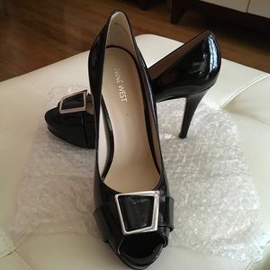 High heel, peep toe pumps. NINE WEST
